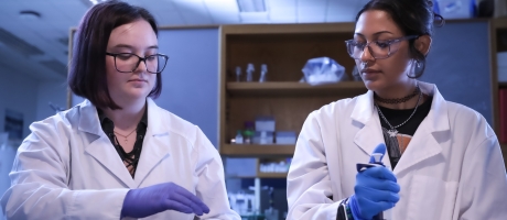 Two students in the lab