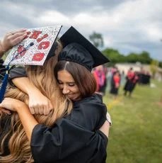 two-female-students-hugging