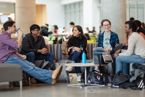 A group of five Carnegie Mellon University students having a conversation
