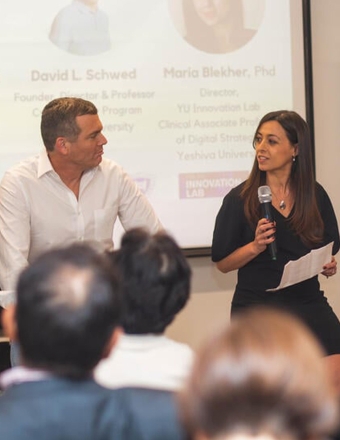 Two speakers at the Yeshiva Innovation Lab