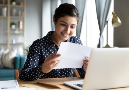 Female student studying at laptop
