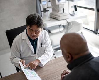 Doctor reviewing a diagram with a patient