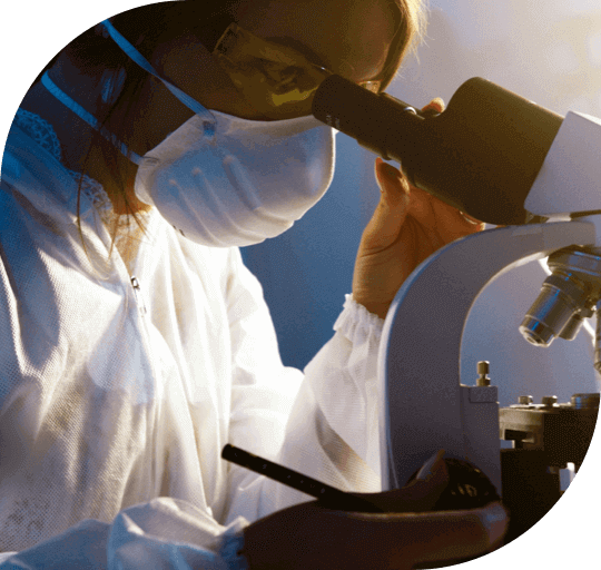Autumn DNA laboratory staff looking at genomes in a microscope