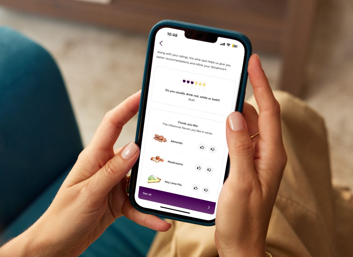 person on phone looking at firstleaf app experience