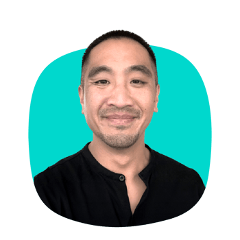 Jason Rahlan headshot on yellow shape