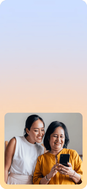 A gradient background with a image on the right side showing a mother and daughter smiling and browsing on an Aura protected phone.