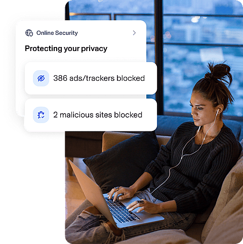 Women is browsing on her laptop + Aura UI overlap that shows 386 blocked ads and 2 malicious sites