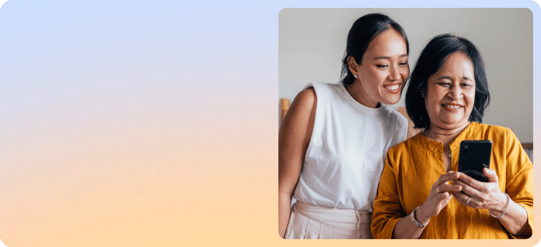 A gradient background with a image on the right side showing a mother and daughter smiling and browsing on an Aura protected phone.