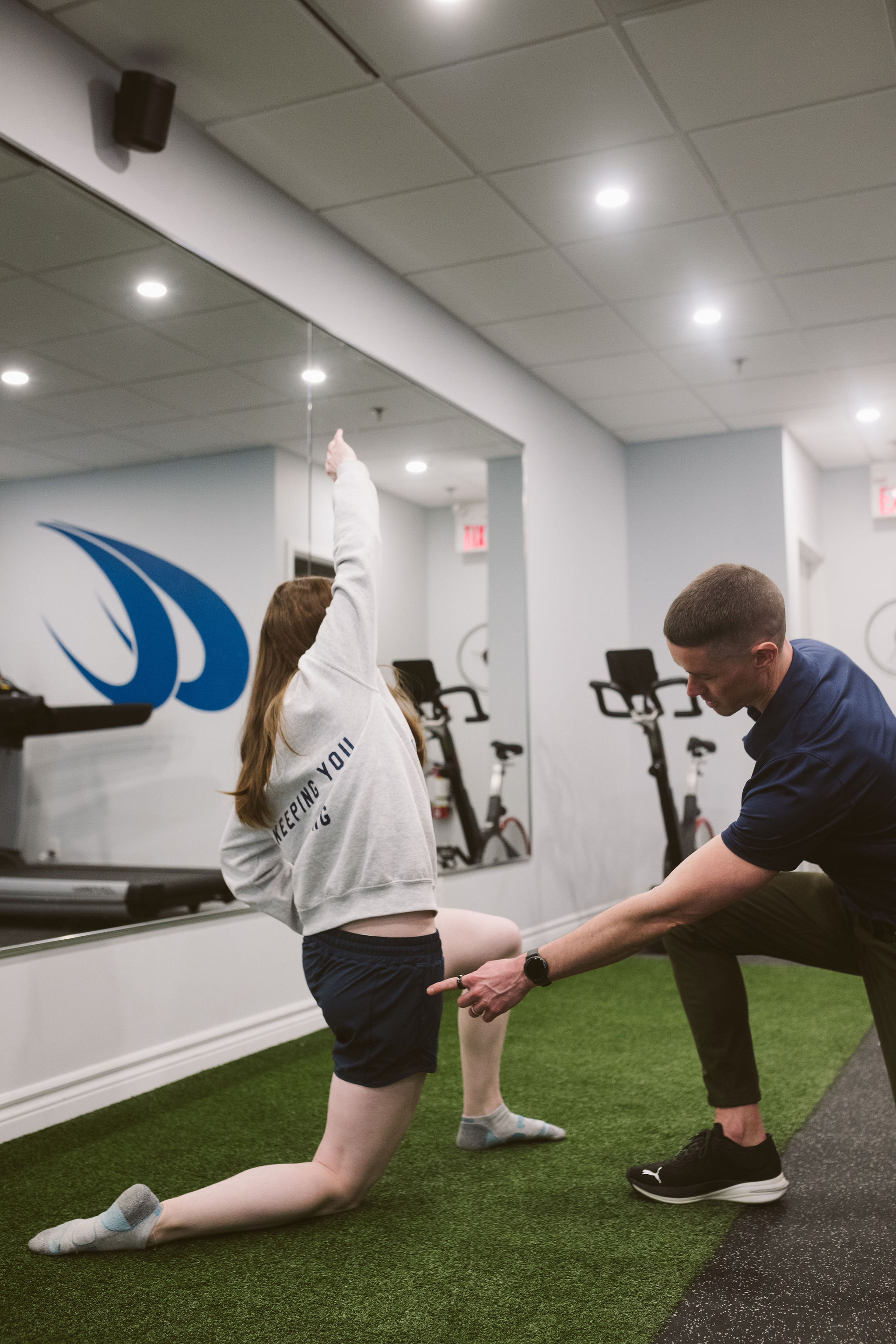 Abstract pink and purple ribbon shapes on a dark blue background