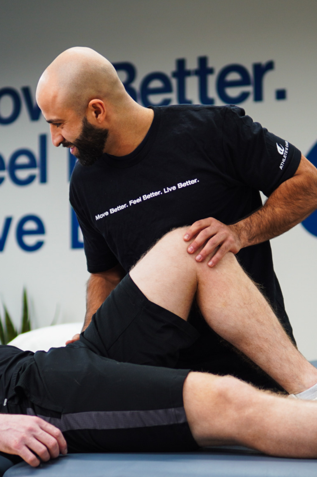 Abstract pink and purple ribbon shapes on a dark blue background