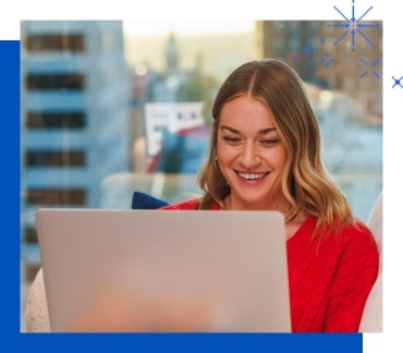 KU MBA student working on her laptop remotely