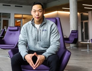 MBA student sitting in a chair