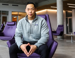 MBA student sitting in a chair