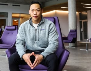 MBA student sitting in a chair