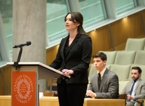 Student speaking at podium