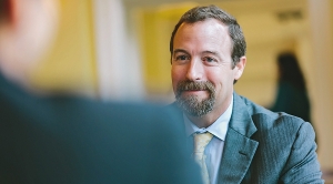 Over-the-shoulder shot of a conversation between two people