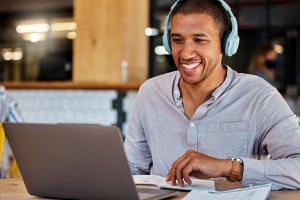 woman sitting in park working