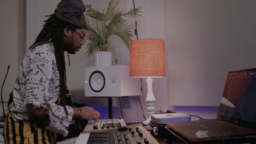 image of student Tadi playing instruments