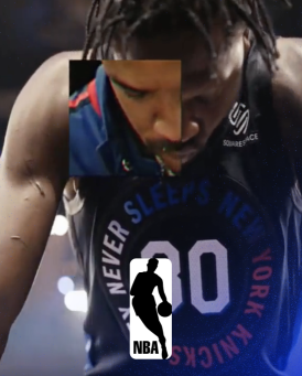 NBA Nicks player looking down. 