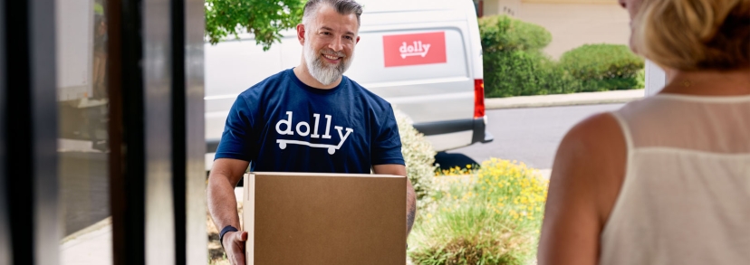 A Dolly Helper moves a large box with ease.
