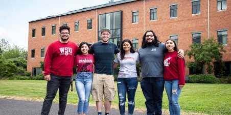 A group of Washington State University of Vancouver students smiling. 