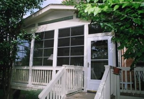 Porch addition with Eze Breeze 4-track window system by Fort Wayne porch builder