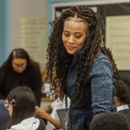 Abstract pink and purple ribbon shapes on a dark blue background