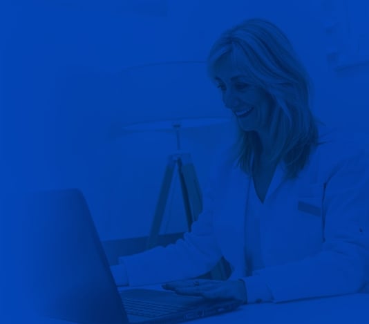 Confident office manager/dentist reviewing claims