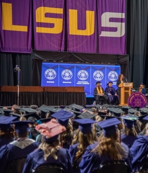 LSU Graduate receiving diploma