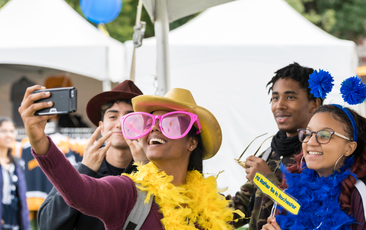 Students smiling taking selfie