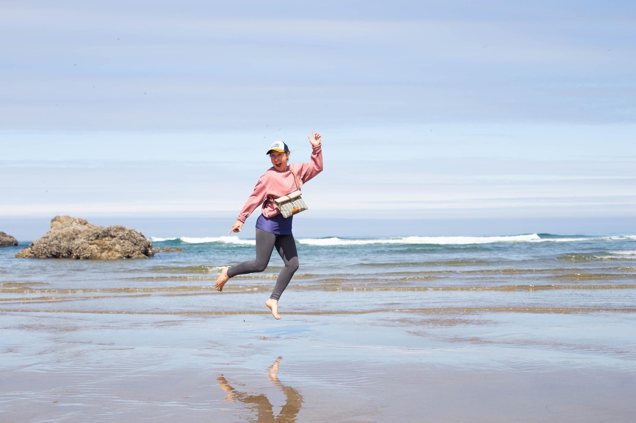 Abstract bright blue curved layers forming smooth wave shapes against a dark background
