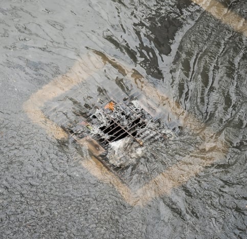 Image of a clogged storm drain