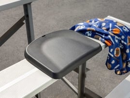 WeatherTech Seat Cushion on a stadium bleacher.