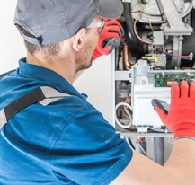 Technician working on furnace 