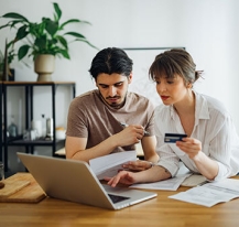 Couple on laptop computer together