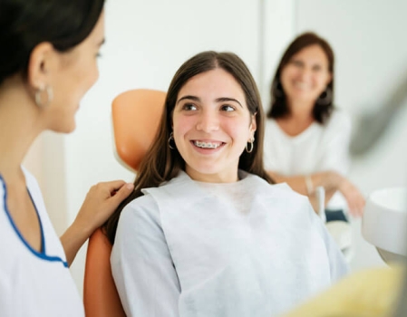 Reception desk with patients waiting