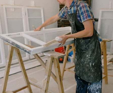 Person with window on sawhorses