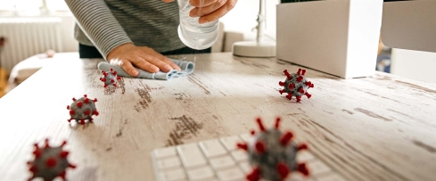 Cleaning a counter with germs on it