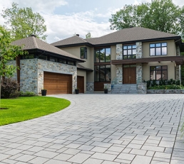 Luxury home with manicured landscaping 