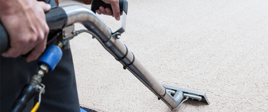 Person using a professional vacuum cleaner 