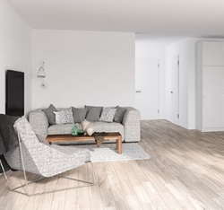 Lighter colored flooring in kitchen, dining area, and living room