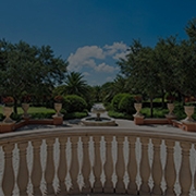 View from Stone Balcony Looking on Water Fountain and Garden