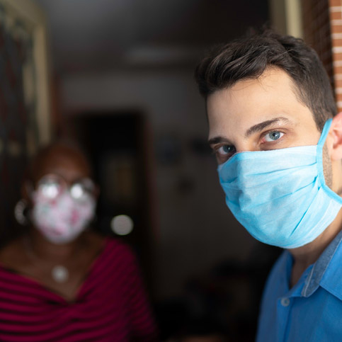 Photo of a man and a woman in the background
