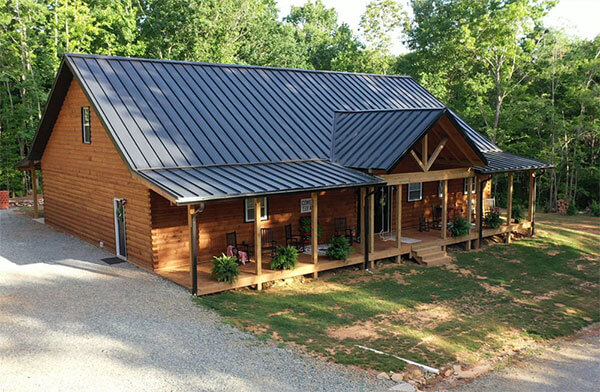 Log cabin with metal roof