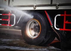High pressure water cleaning truck wheel
