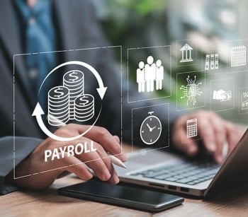 Person working on a laptop computer with graphics for payroll and other tasks over the top of the image