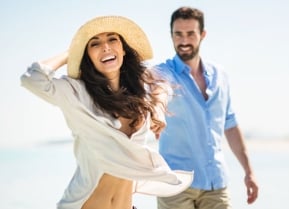Woman and man at the beach
