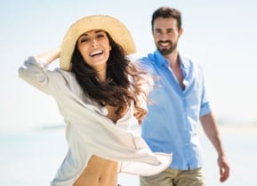 Woman and man at the beach
