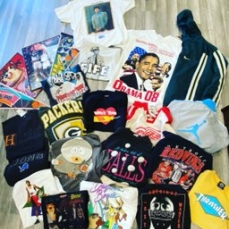 Photo of a variety of vintage shirts and items