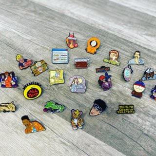 Photo of vintage and reproduction enamel pins